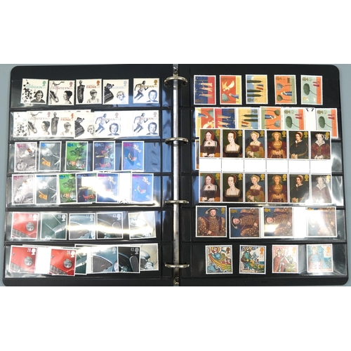 576 - Three albums of predominantly British mint unused stamps, various denominations and genres including... 