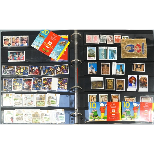 575 - Five albums of predominantly British mint unused stamps, various denominations and genres, some bloc... 