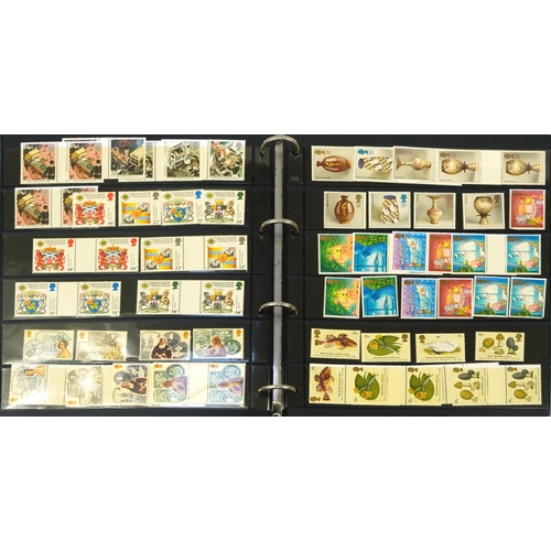 575 - Five albums of predominantly British mint unused stamps, various denominations and genres, some bloc... 