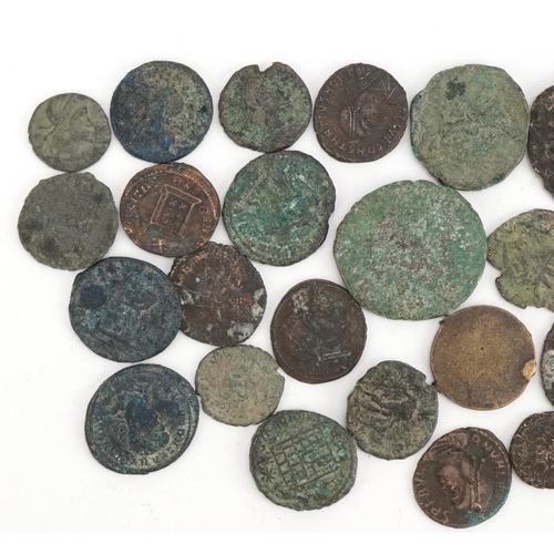 542 - Twenty Roman and later coins, various denominations and emperors