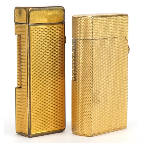 67 - Two Dunhill gold plated pocket lighters