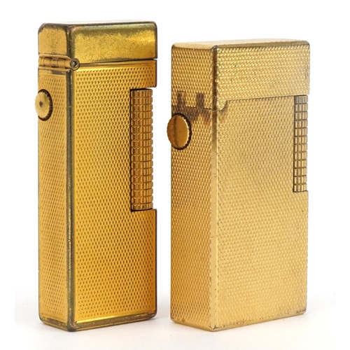 67 - Two Dunhill gold plated pocket lighters