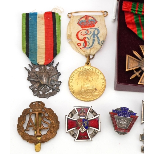 674 - British and foreign militaria and commemorative collectables including sterling silver Rifle & Grena... 