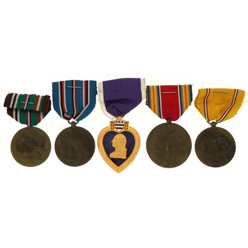 672 - Five American military interest medals including Purple Heart