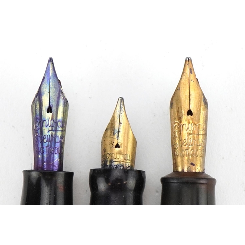 288 - Three vintage marbleised fountain pens including two Conway Stewart, each with gold nibs