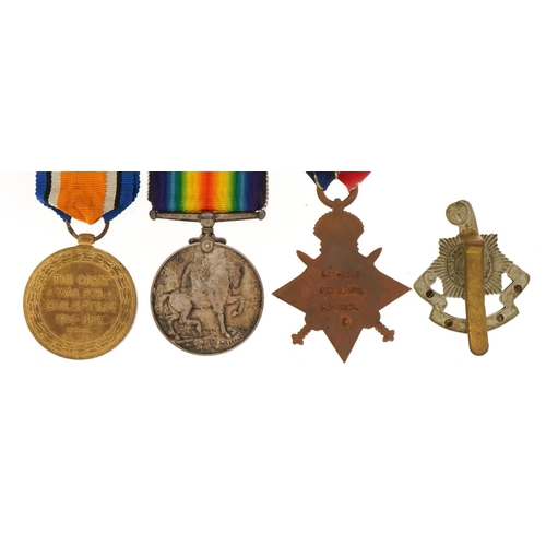 653 - British military World War I trio and Royal Sussex Regiment cap badge, the trio awarded to LSR-2325-... 