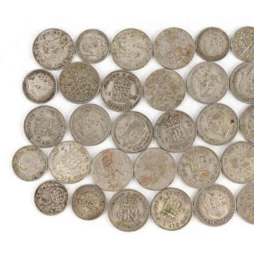 557 - Victorian and later British coinage comprising shillings and thrupenny bits, 105.0g