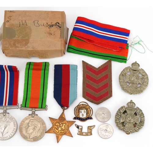 659 - British military World War II militaria including medals and For Loyal Service lapel