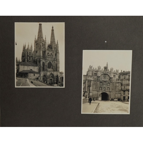 607 - Early 20th century European black and white photographs arranged in an album including bullfighting,... 