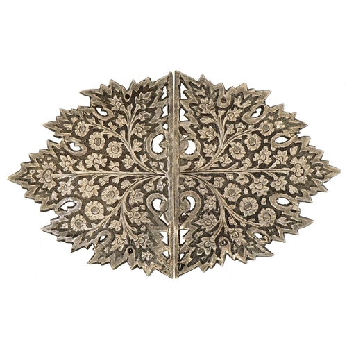 2740 - Unmarked silver two piece belt buckle embossed with blossoming trees, 11cm wide, 53.8g