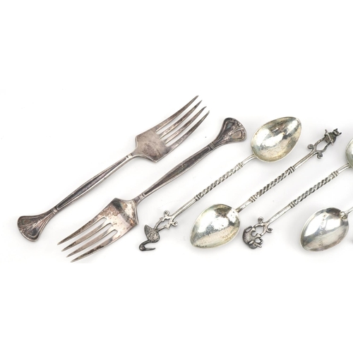 2749 - Eight Victorian and later silver and white metal spoons and forks, the largest 14cm in length, weigh... 