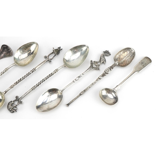 2749 - Eight Victorian and later silver and white metal spoons and forks, the largest 14cm in length, weigh... 