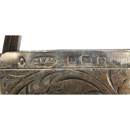 2741 - Two rectangular silver vestas with engraved and engine turned decoration together with a love heart ... 