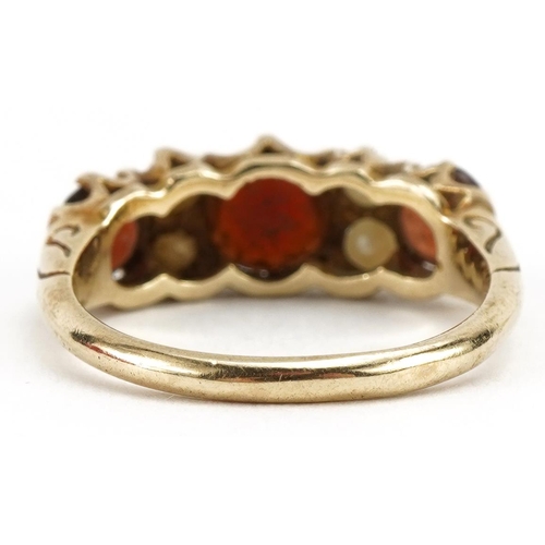 2070 - Victorian style 9ct gold garnet and seed pearl ring, the largest garnet approximately 6.0mm in diame... 