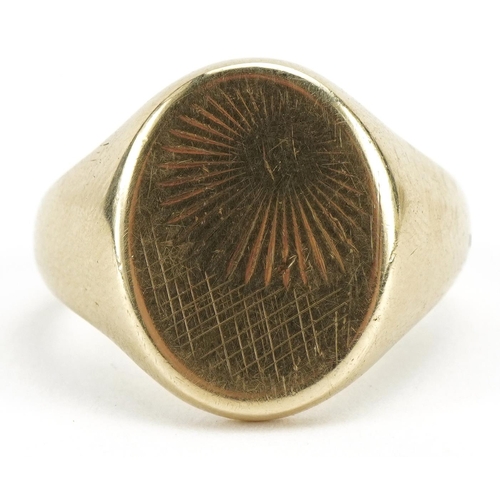 2032 - 9ct gold signet ring with engraved decoration, size U, 10.9g