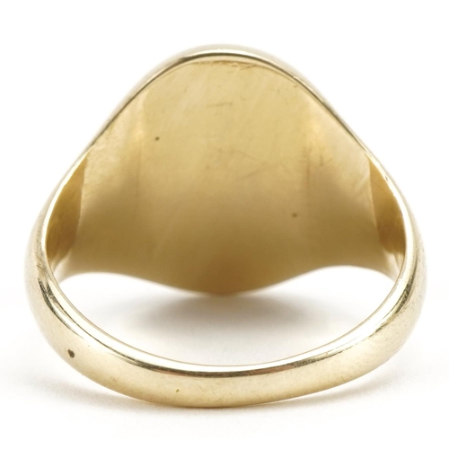 2032 - 9ct gold signet ring with engraved decoration, size U, 10.9g