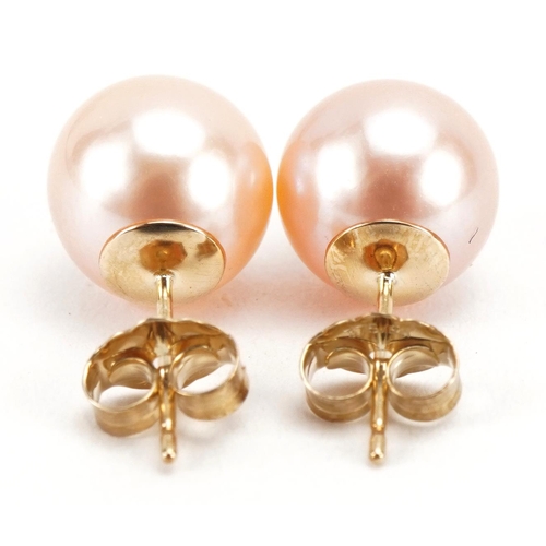 2295 - Pair of 9ct gold freshwater pearl stud earrings, 9mm in diameter, 2.6g