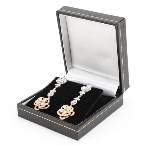 2081 - Pair of 18ct two tone gold chandelier style diamond drop earrings housed in a tooled leather box, to... 