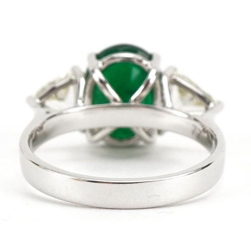 2074 - 18ct white gold emerald and diamond three stone ring, total emerald weight approximately 2.93 carat,... 