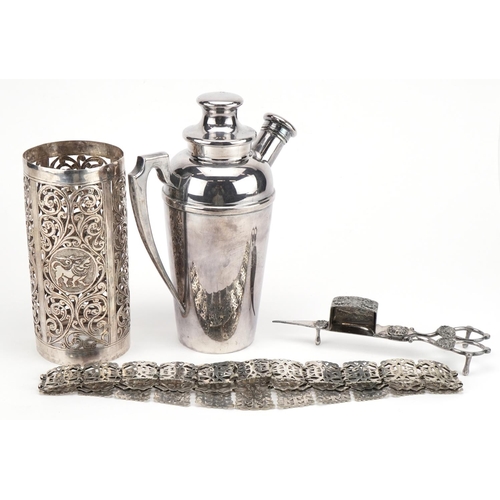 1187 - Silver plated items and an Indian white metal bottle holder including a cocktail shaker and candle s... 