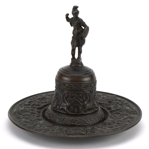 63 - 19th century Grand Tour patinated bronze bell on stand with figural handle cast with mythical faces ... 