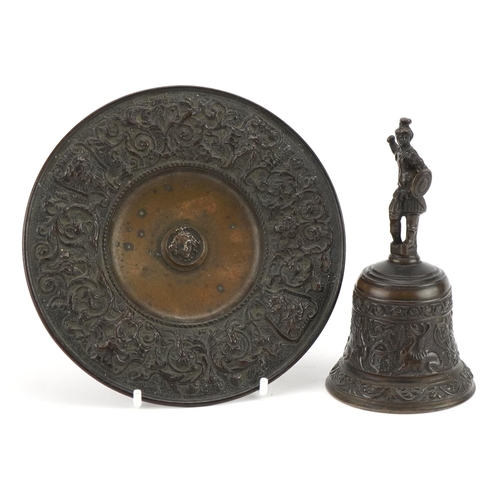 63 - 19th century Grand Tour patinated bronze bell on stand with figural handle cast with mythical faces ... 
