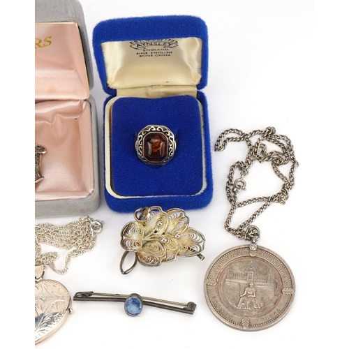 2652 - Victorian and later silver jewellery including a love heart locket, locket brooch, filigree brooches... 