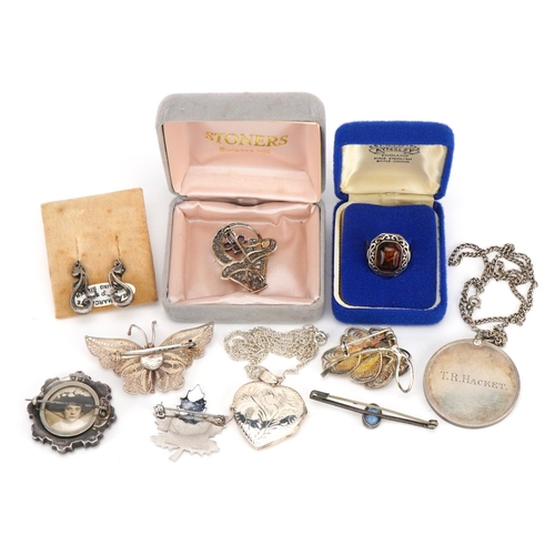 2652 - Victorian and later silver jewellery including a love heart locket, locket brooch, filigree brooches... 