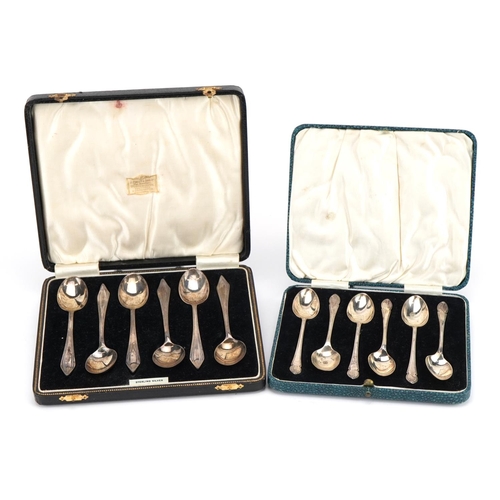 2762 - Two sets of six silver teaspoons housed in velvet and silk lined fitted cases including J Purser & S... 