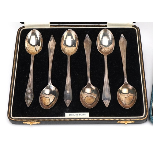 2762 - Two sets of six silver teaspoons housed in velvet and silk lined fitted cases including J Purser & S... 