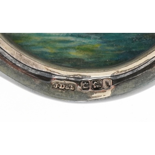 2688 - James Dixon & Sons Ltd, set of three Edwardian oval silver photo frames, each housing a watercolour ... 