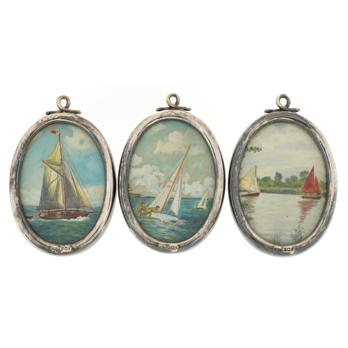 2688 - James Dixon & Sons Ltd, set of three Edwardian oval silver photo frames, each housing a watercolour ... 