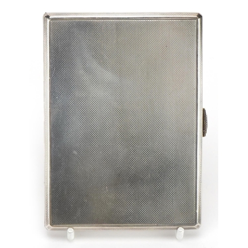 2769 - S J Rose & Son, Elizabeth II rectangular silver cigarette case with engine turned decoration and gil... 