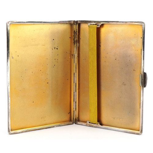 2769 - S J Rose & Son, Elizabeth II rectangular silver cigarette case with engine turned decoration and gil... 