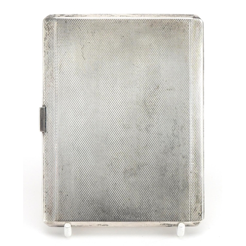 2674 - Elizabeth II rectangular silver cigarette case with engine turned decoration and gilt interior, Birm... 