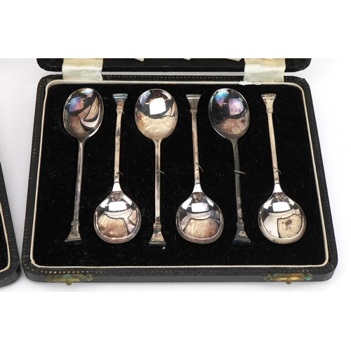 2724 - Two cased sets of six silver teaspoons, the largest each 10.5cm in length, total 109.2g