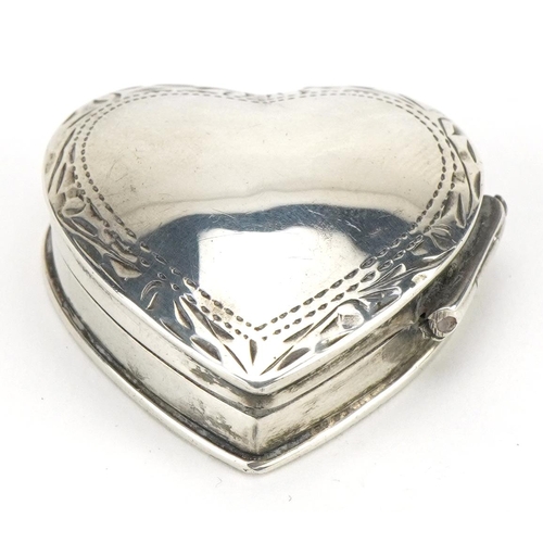 2750 - Silver love heart pillbox with engraved decoration, Birmingham import marks, 3.0cm high, 9.1g