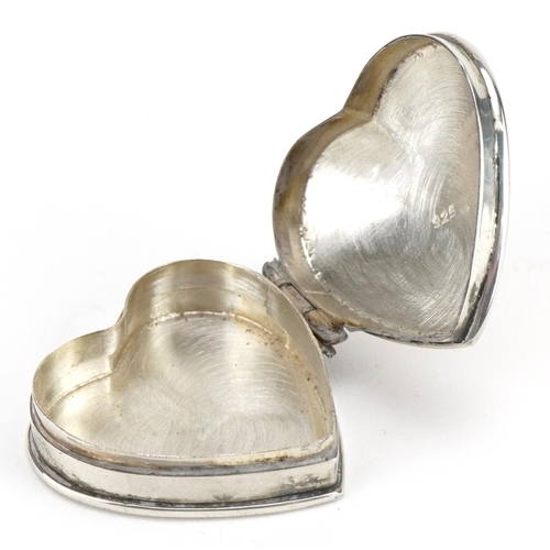 2750 - Silver love heart pillbox with engraved decoration, Birmingham import marks, 3.0cm high, 9.1g