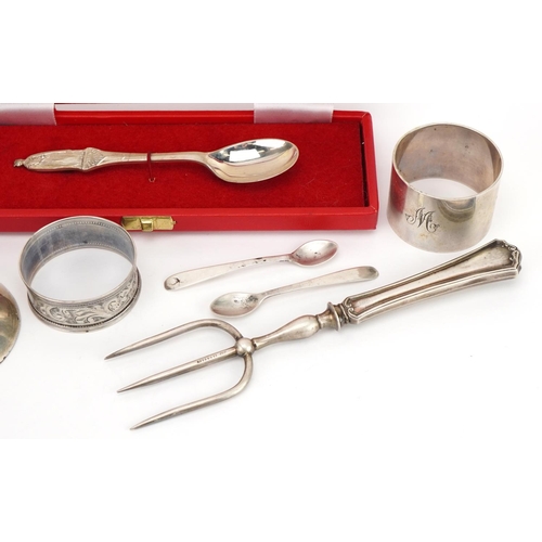 2765 - Silver and white metal objects including Elizabeth II Silver Jubilee spoon, napkin rings and a silve... 