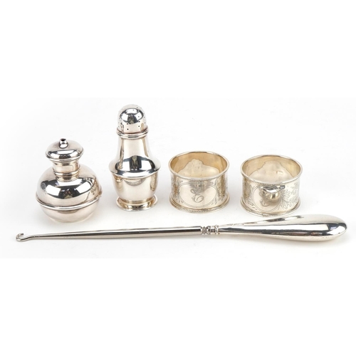 2756 - Edwardian and later silver objects including two napkin rings with engraved floral decoration, peppe... 