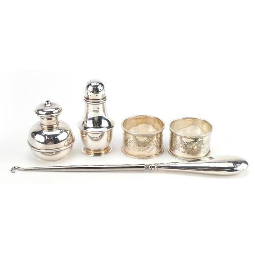 2756 - Edwardian and later silver objects including two napkin rings with engraved floral decoration, peppe... 