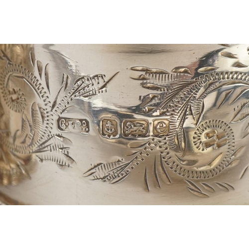 2756 - Edwardian and later silver objects including two napkin rings with engraved floral decoration, peppe... 