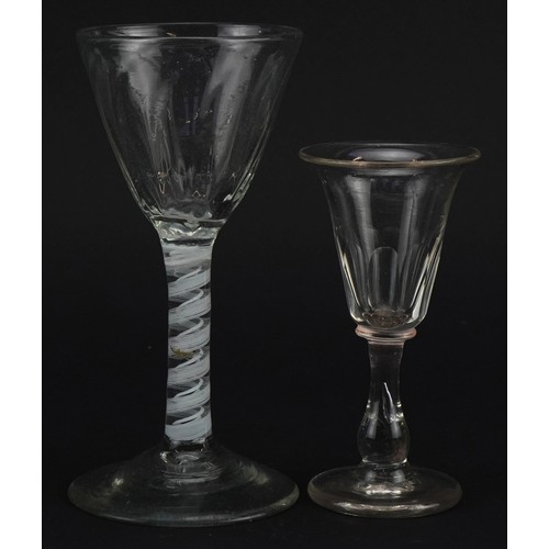 115 - Two antique wine glasses including an example with opaque twist stem, the largest 15cm high