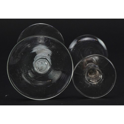 115 - Two antique wine glasses including an example with opaque twist stem, the largest 15cm high