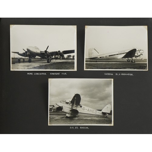 567 - Military interest black and white photographs arranged in an album including Bristol Freighter, RAF ... 