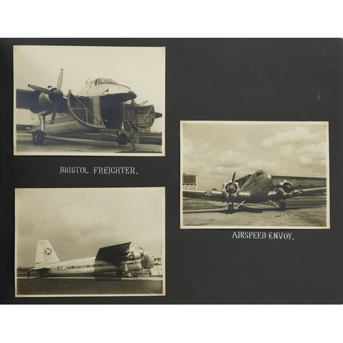 567 - Military interest black and white photographs arranged in an album including Bristol Freighter, RAF ... 