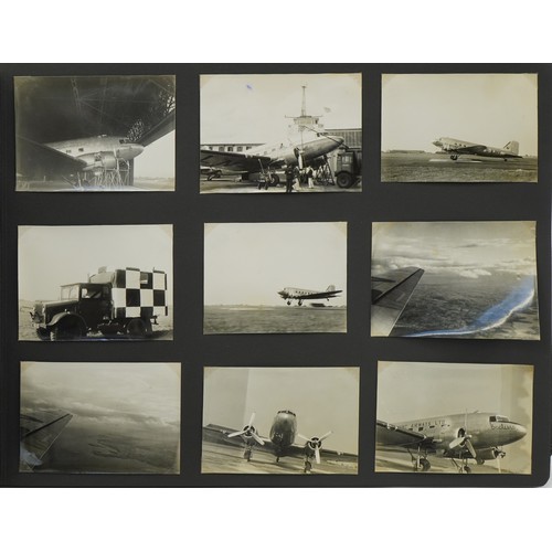 567 - Military interest black and white photographs arranged in an album including Bristol Freighter, RAF ... 