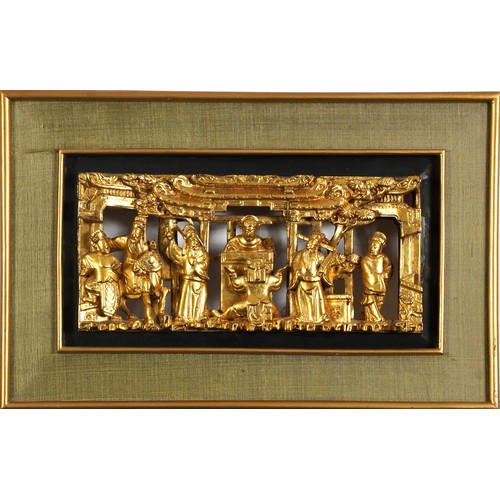 81 - Two Chinese giltwood panels deeply carved with an Emperor and attendant and with figures crossing br... 