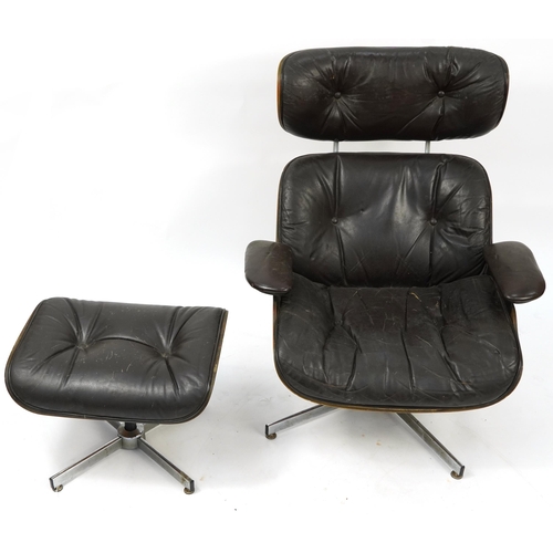 1001 - Selig, Mid Century Eames longue chair and matching footstool with brown leather button upholstery, t... 