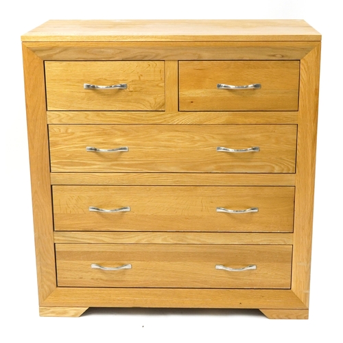 1002 - Contemporary light oak five drawer chest, 94cm H x 90cm W x 45cm D